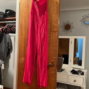 Pink lily strapless jumpsuit with smocked top and button detail with belt